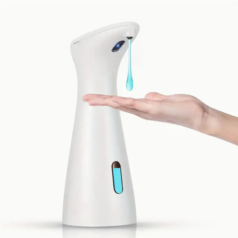White soap dispenser with blue liquid being dispensed onto a hand 