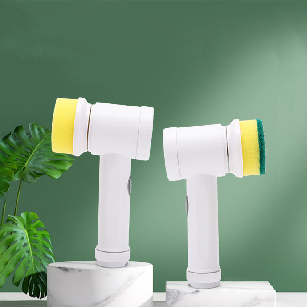 Two white cleaning tools with yellow scrubber heads on a green background